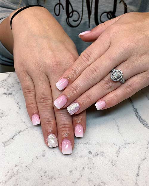 Stunning pink and white ombre short square nails with glitter accent nail