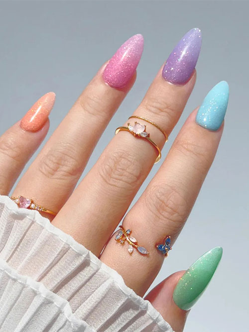 Long almond-shaped multicolored iridescent nails to transition your fingernails from spring to summertime Long almond-shaped multicolored iridescent nails to transition your fingernails from spring to summertime