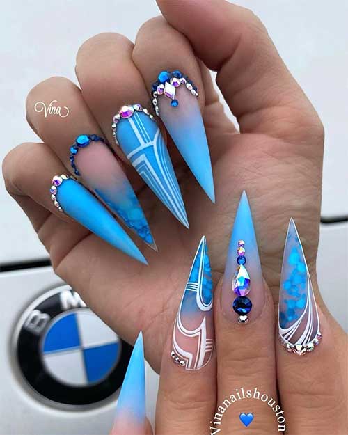 Blue ombre matte nails 2020 stiletto shaped with rhinestones design Blue ombre matte nails 2020 stiletto shaped with rhinestones design