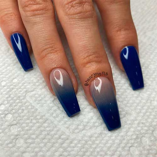 Cute navy blue ombre acrylic nails with navy blue coffin nails design