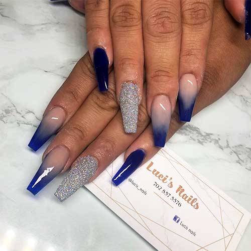 Cute navy blue ombre coffin nails with silver glitter accent nail design