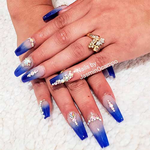 Cute royal blue ombre nails coffin shaped with rhinestones