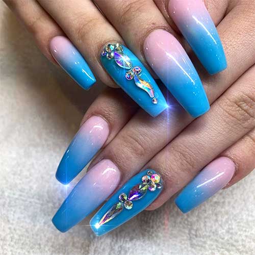 Gorgeous pink and blue ombre nails coffin shaped with rhinestones on accent nail