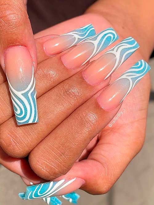 Long Ombre Blue Nails with White Swirls Long coffin shaped Ombre Blue Nails with White Swirls