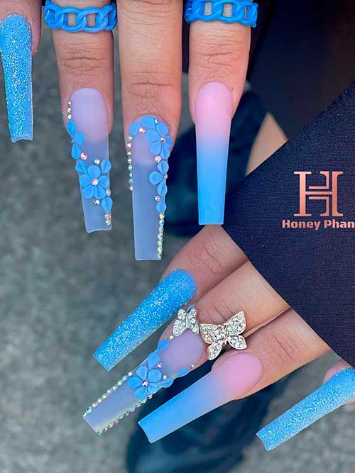 Long coffin shaped matte Blue Ombre Nails with 3D Flowers, glitter, and rhinestones