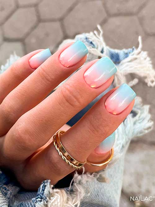 Short Baby Blue Ombre Nails with Embedded Sparkling Particles