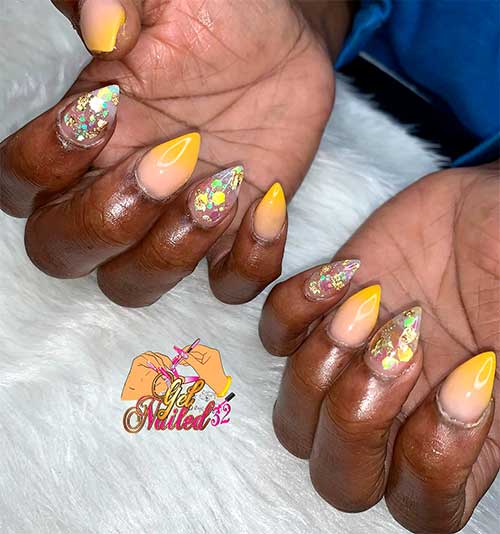 mustard yellow ombre nails short stiletto shaped with two accent clear nails adorned with glitter and gold foil mustard yellow ombre nails short stiletto shaped with two accent clear nails adorned with glitter and gold foil