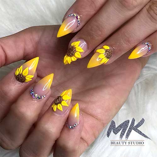short stiletto yellow ombre sunflower nails set with rhinestones