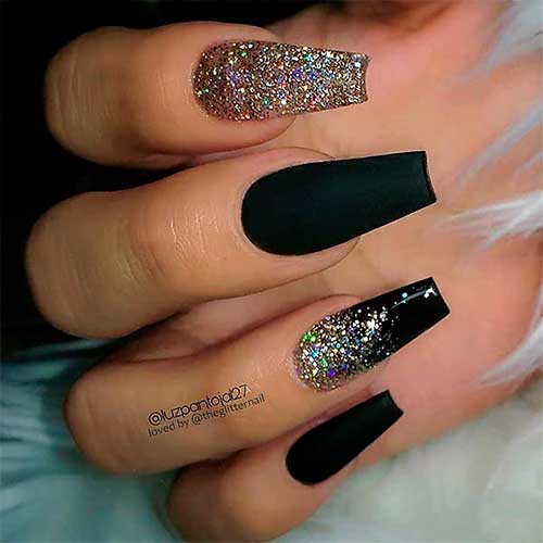 Black coffin nails with gold glitter with accent gold glitter nail design