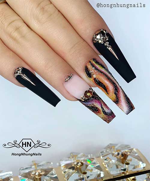 Black matte coffin nails with rhinestones and two accent bubble acrylic nails 2020 over snake skin pattern