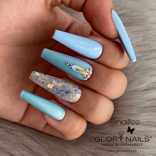 Cute glossy light blue coffin nails with glitter accent nail and rhinestones