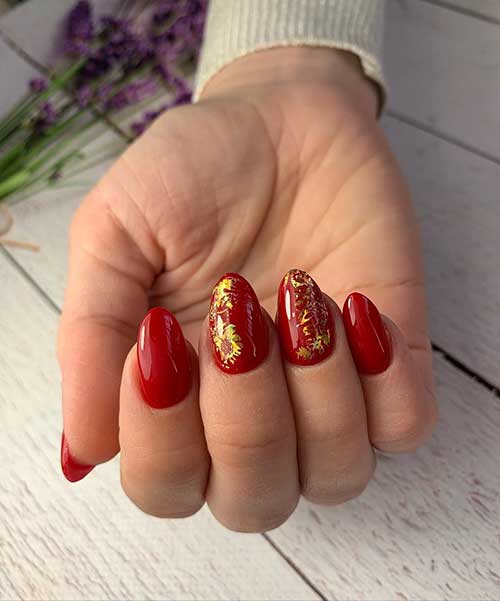 Cute red and gold nails short 2020, with two gold foil accent almond nails 2020