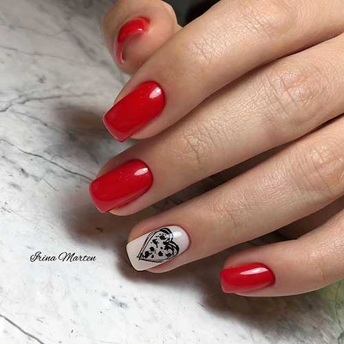 Cute red nails with black heart on accent sheer white nail design