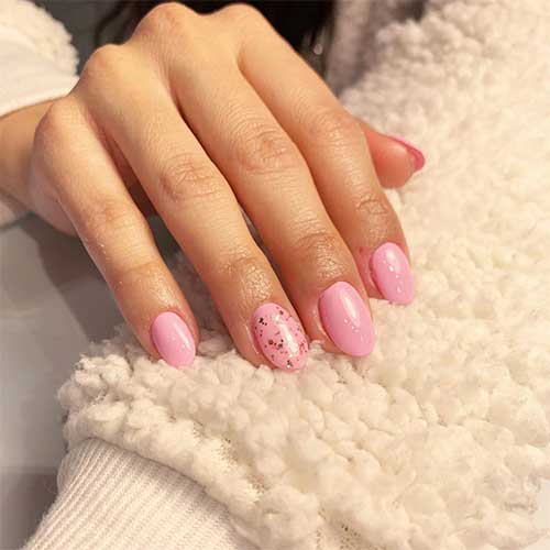 Cute round short nails acrylic pink with glitter on accent nail