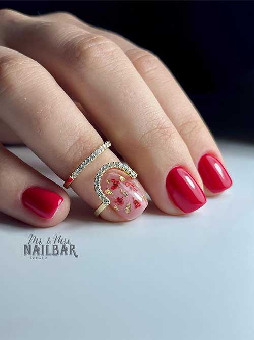 Glossy Short Red Nails with Tiny Flowers on A Nude Accent Nail Adorned with Gold Patches
