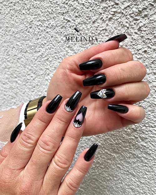 Glossy black nails 2020 coffin shaped with rhinestones and accent heart nail design