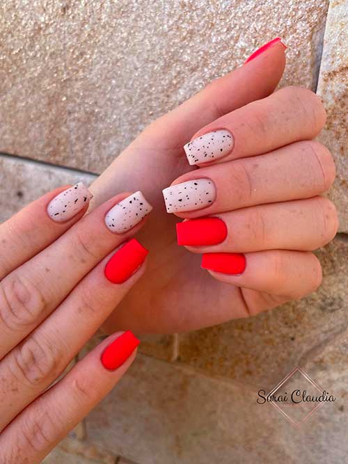 Matte Short Red Nails with Speckled Nude Accents Matte Short Red Nails with Speckled Nude Accents