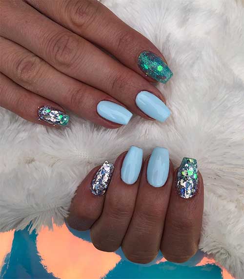 Summer light blue nails coffin shaped with two accent green glitter coffin nails 2020