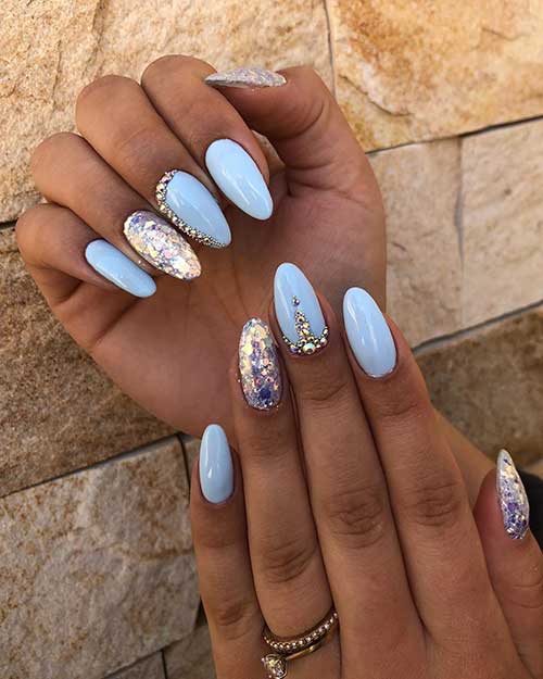 light blue nails for summer, almond shape light blue acrylic nails with rhinestones and two accent almond glitter acrylic nails 2020