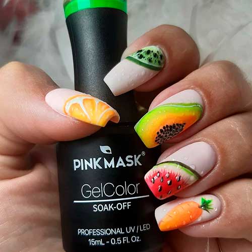 Amazing fruit nails design consists of square shaped cute nude nails art with some of your favorite fruits!