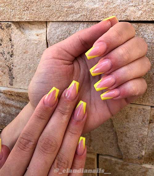 Cute bright yellow V french tip coffin nails set!