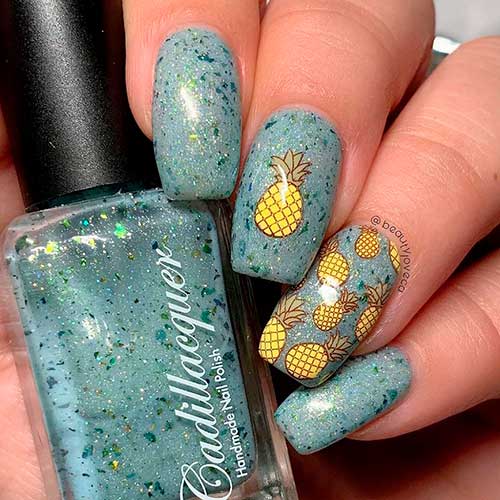 Cute fruit nails consist of glitter square nails adorned with fruit nail art stickers that create cute pineapple nails! Cute fruit nails consist of glitter square nails adorned with fruit nail art stickers that create cute pineapple nail art!