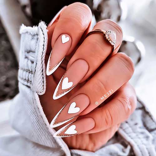 Double V French Tip Nails with Hearts for valentine’s day.