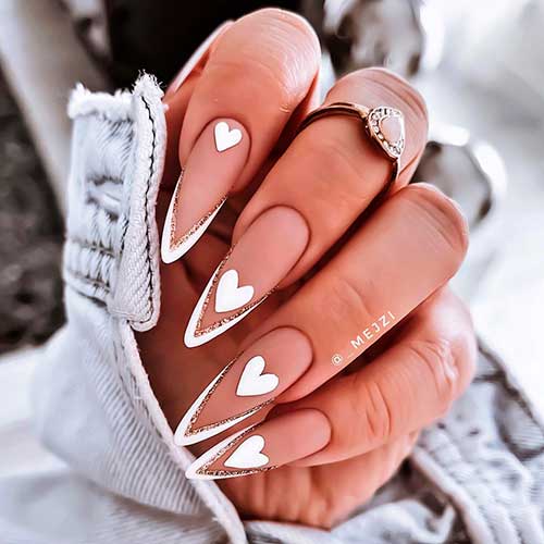 Double V French Tip Nails with Hearts for valentine’s day. Double V French Tip Nails with Hearts for valentine’s day.