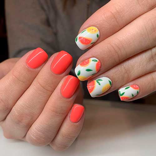 Short Square Shaped Grapefruit Nails Design on White nails and plain orange nails on the other hand