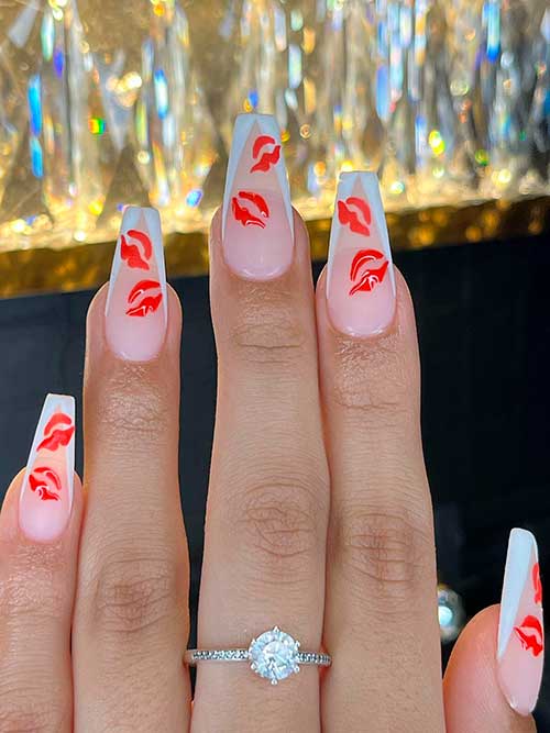 White V French Nails with Red Kiss Lips Long coffin-shaped white V French tip nails with red kiss lips to celebrate Valentine’s Day