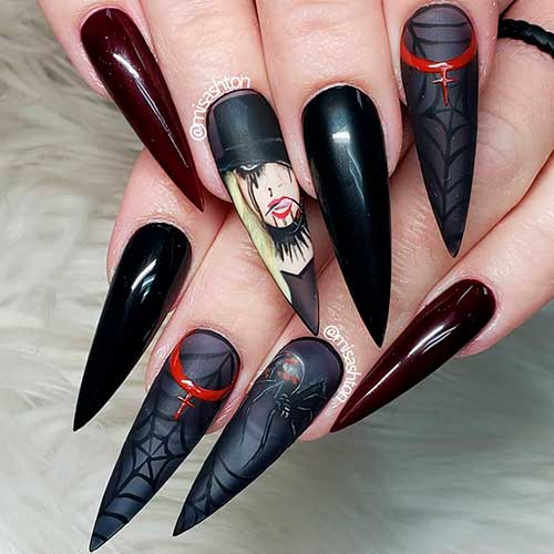 Black Maria Brink’s Halloween themed nails 2020 Idea consists of accent Maria Brink’s nail, spider web and Gothic nails - Halloween Nail Ideas