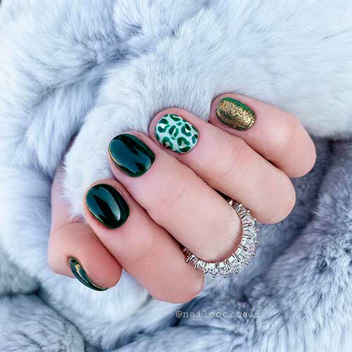 Cute short black nails with glitter and leopard nails art!