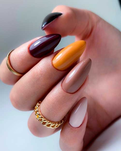 Cute glossy mixed coloring fall nails 2021 on almond shaped style