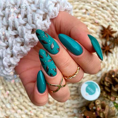 Gorgeous Fall Leaves on two accent green almond fall nails 2021 for a unique look