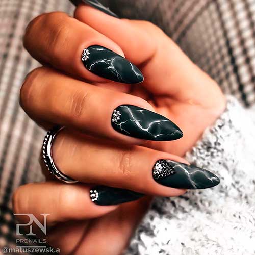 Chic almond shaped white and black marble nails design, one of the most beautiful marble nail art designs!
