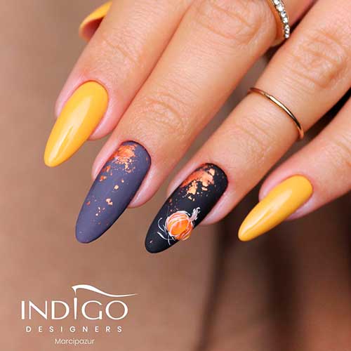 Cute almond shaped autumn shiny yellow nails 2020 with two accent black and gray nails with design for fall season - yellow nail designs