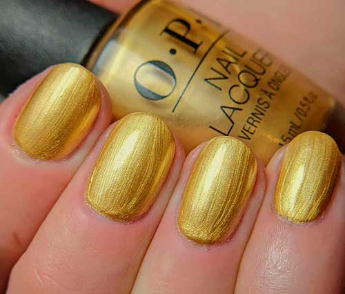 Cute gold metallic nails with OPI This Gold Sleighs Me from OPI Shine Bright Nail Lacquer Holiday Collection 2020