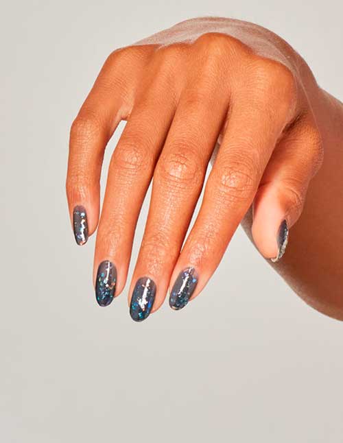 Cute grey glitter nails with OPI Puttin’ on the Glitz from OPI Shine Bright Nail Lacquer Holiday Collection 2020