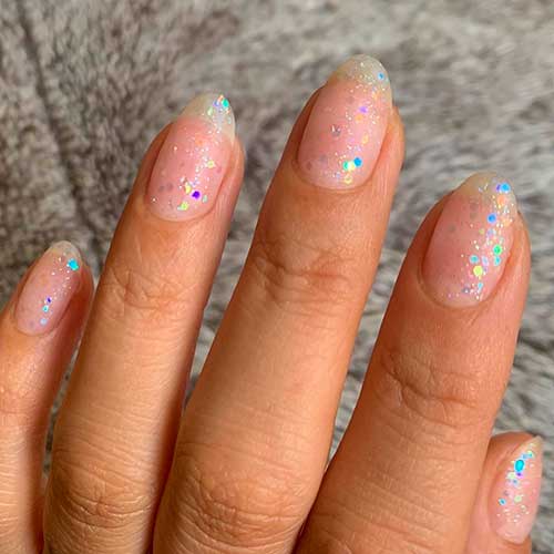 Cute iridescent glitter nails with OPI All A’twitter in Glitter from OPI Shine Bright Nail Lacquer Holiday Collection 2020