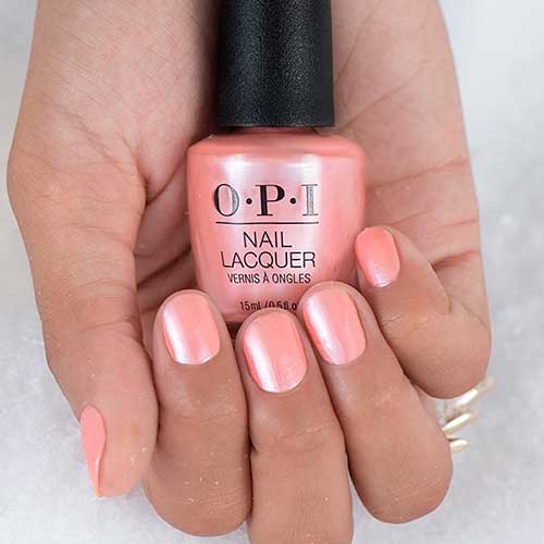 Shiny pink pearlescent nails done with OPI Snowfalling for You from OPI Shine Bright Nail Lacquer Holiday Collection 2020