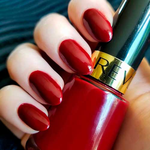 Top nails manicured with red Revlon valentine super lustrous nail enamel nail polish