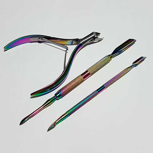 Use a Cuticle Pusher and Cuticle Nipper to maintain your natural nails!