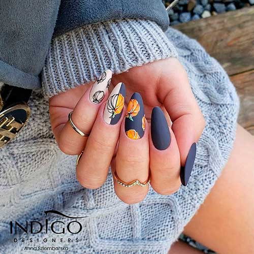 White and grey almond shaped pumpkin nails 2020 for Halloween!