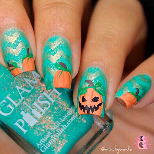 Turquoise pumpkin nails 2020 with gold glitter for Halloween!