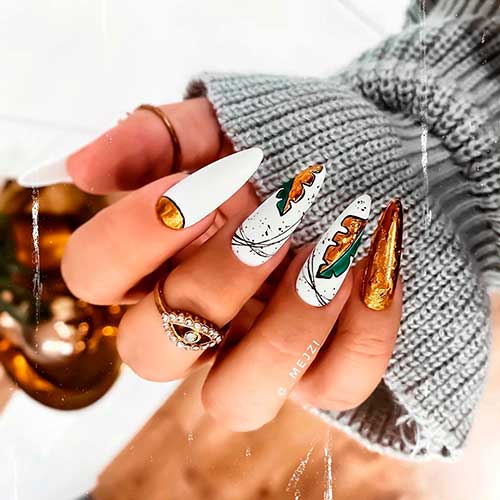 Nice nails set consists of white almond fall nails 2020 design with foil and leaves that suit Christmas time!