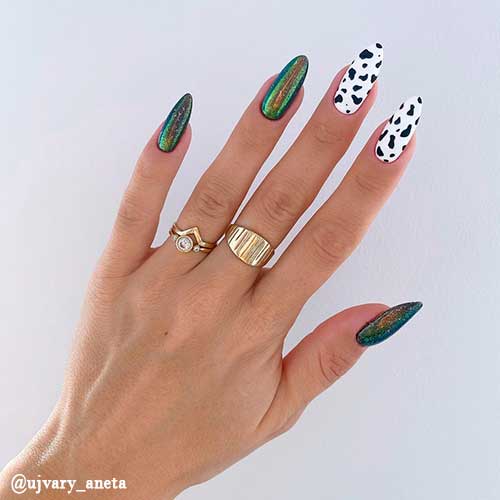 Cute green chrome nails with two accent cow print nails design are perfect fall nails