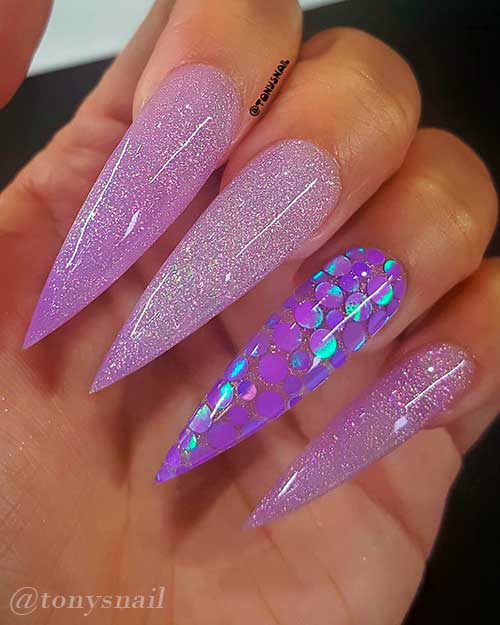 Amazing purple acrylic nails design which blends purple shimmer nails with purple glitter nails!