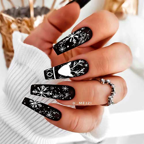 Coffin shaped black and white snowflake nails 2020 with accent reindeer nail art for Christmas celebration!