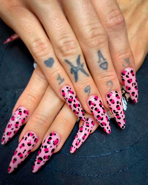 Cute long Pink Cheetah Print nail design with black and pink crooked lines design!