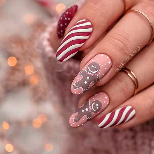 Cute round matte red candy cane nails 2020 design for Christmas party